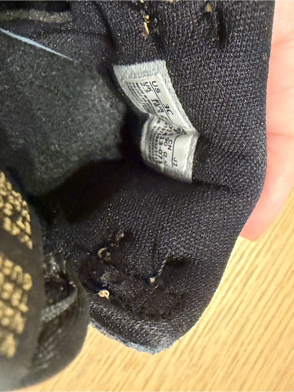 Jordan Baby Black and Gold High-Top Sneaker